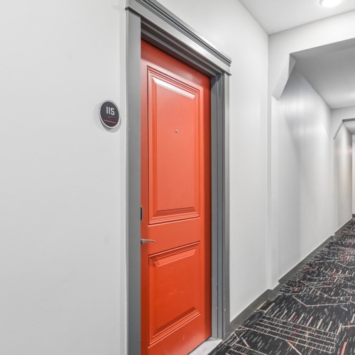 hallways with red doors
